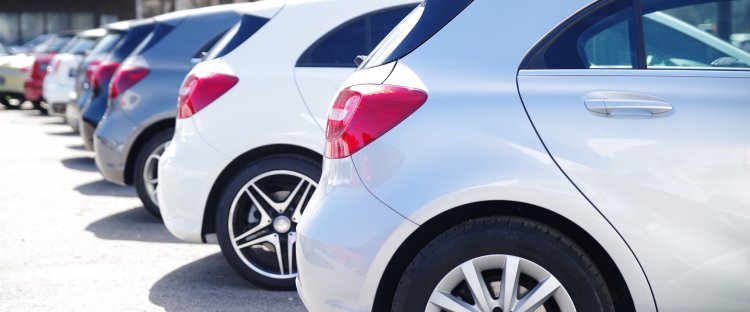 usaa extended vehicle protection cars in a row in parking lot features